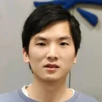 梁定康